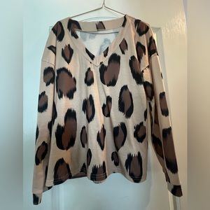 Animal print top.  V Neck. Brown. Size small.